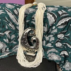 Elegant Silver Pendant with White Beaded Necklace